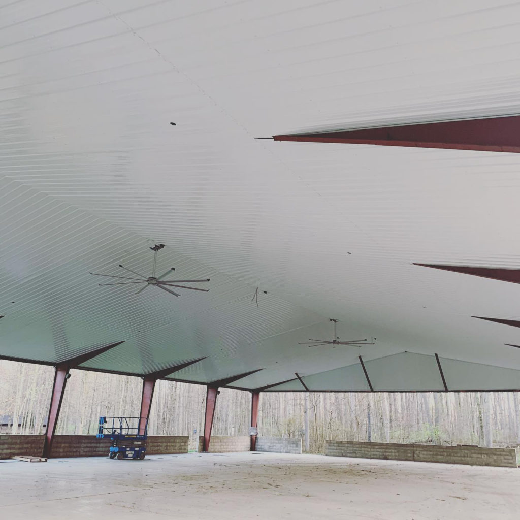 Renovation progress on our pavilion includes brand new overhead fans and a complete covering of the ceiling with a white sheet metal